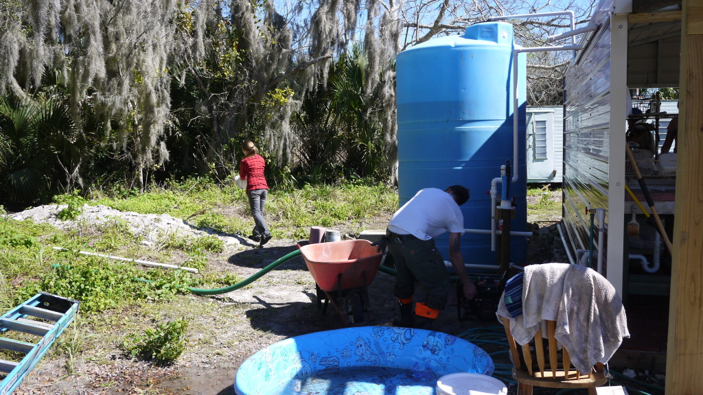 Kristin & Gary (Liz's man) refilling the water tank