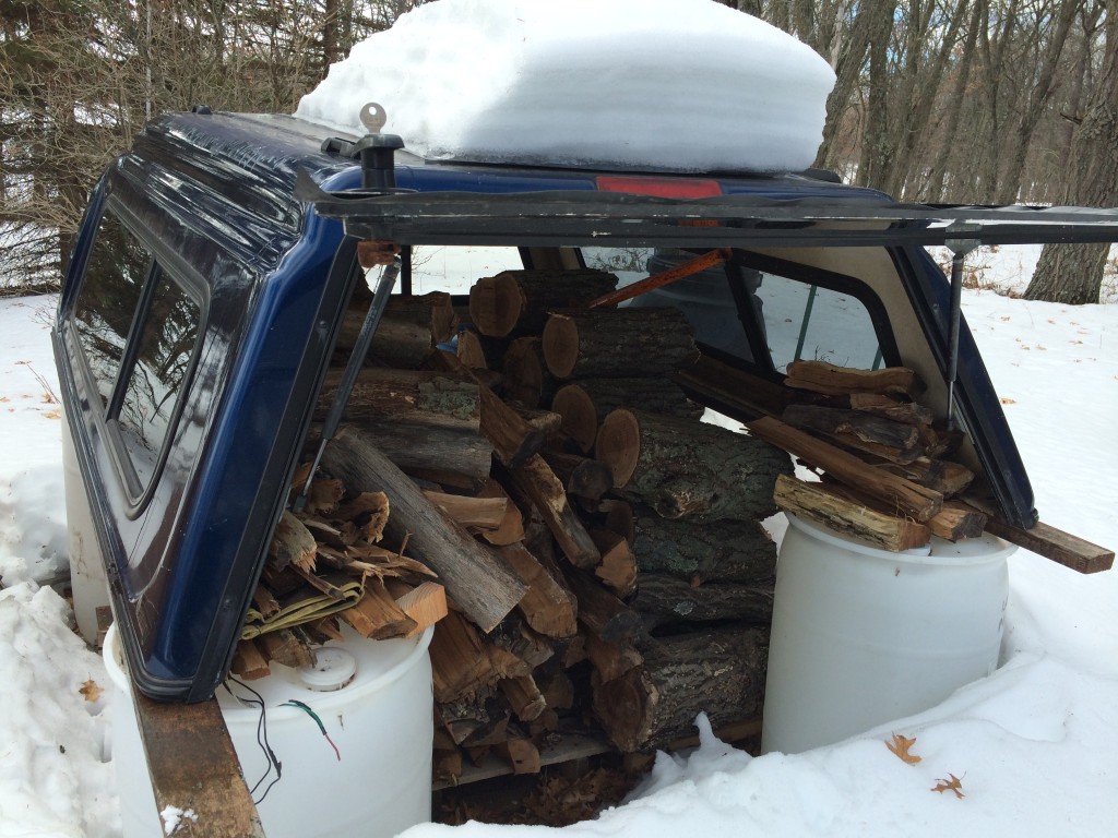 the truck topper woodshed kept the firewood snug & dry