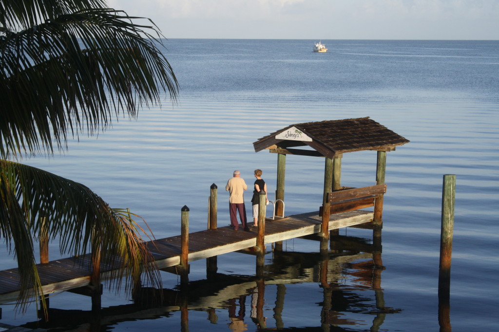 Kristin's parents enjoy the early morning view from the dock