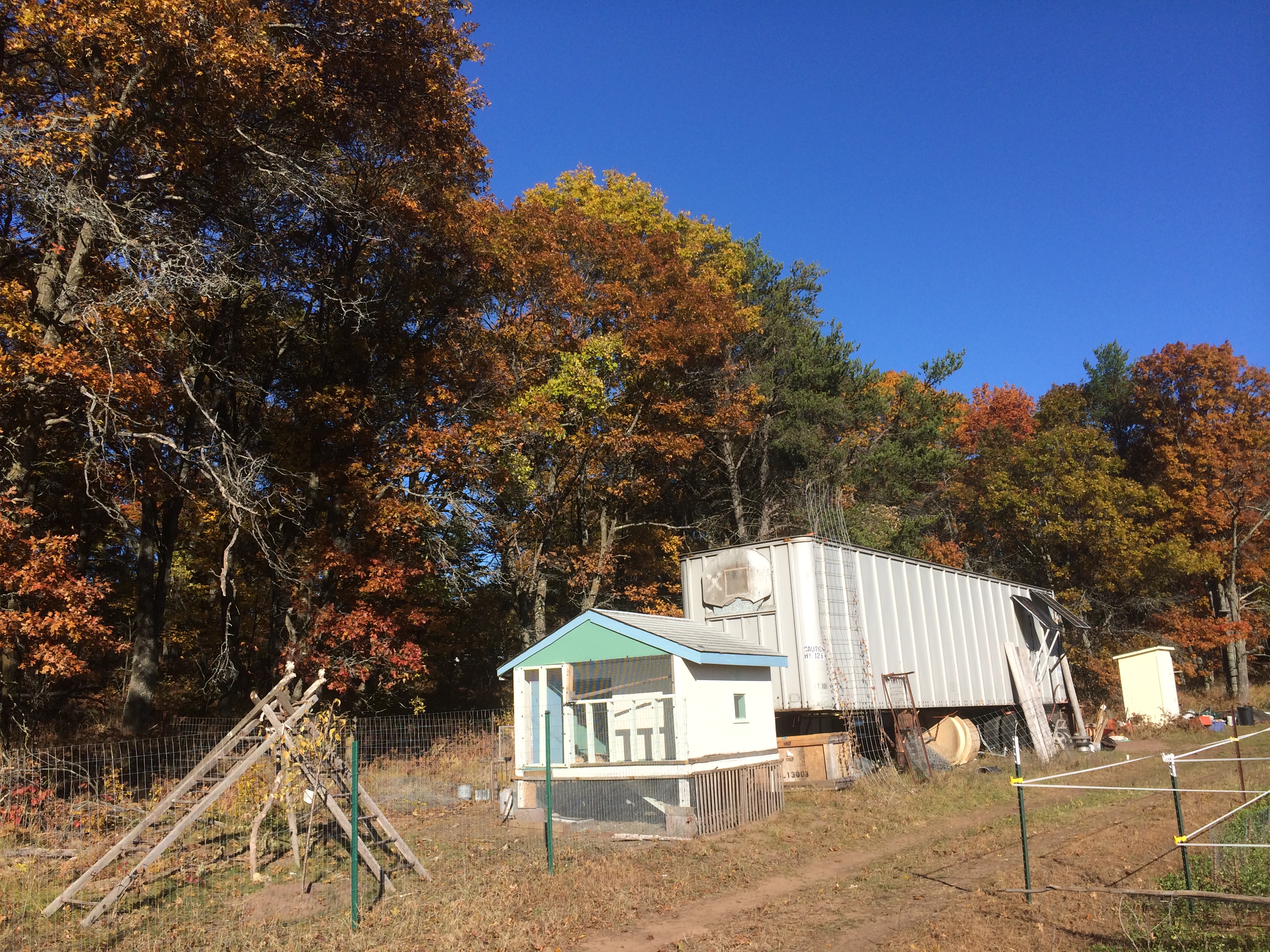 the free chicken coop nestled up to the free semi truck