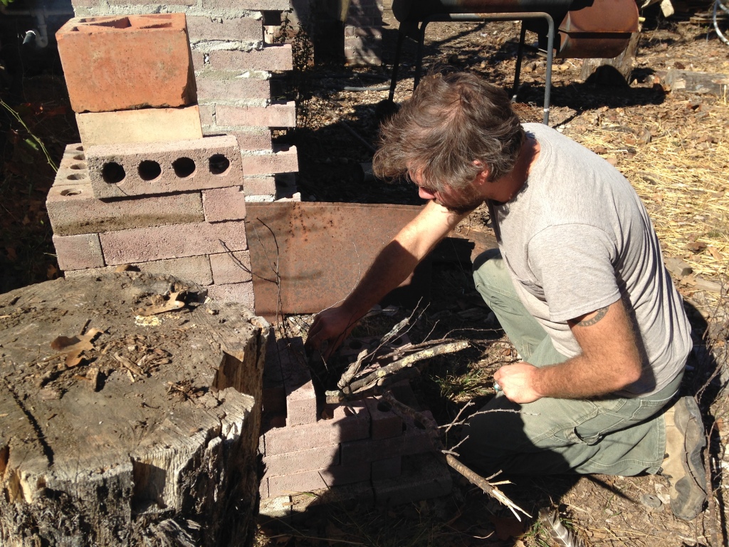 testing the new rocket stove (for heating up chicken/duck dunking water)