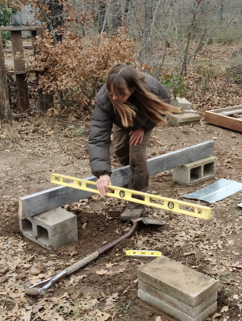 leveling the foundation for the new structure