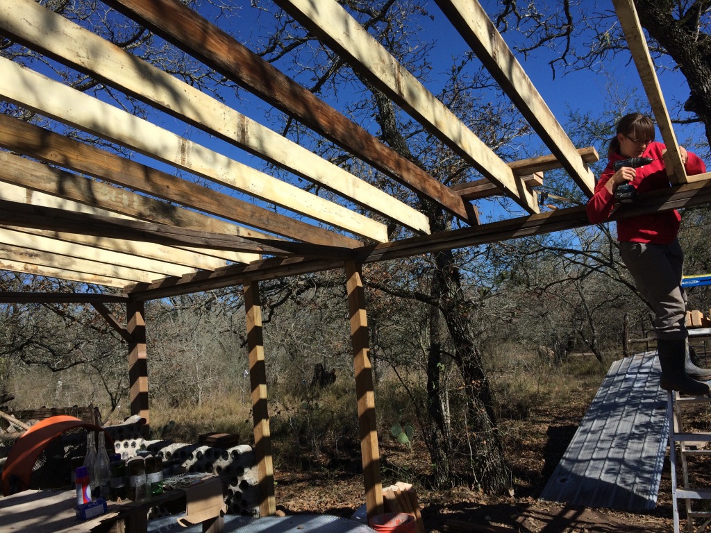 Kristin working on the bottlehouse roof