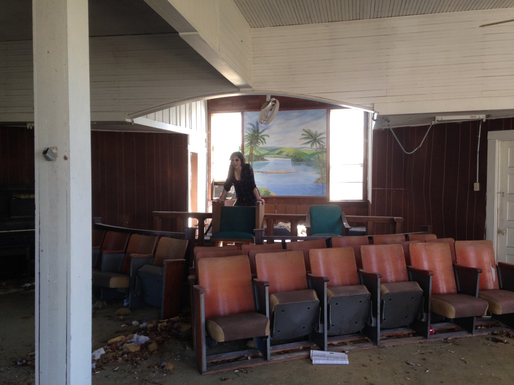 Jess at the altar of an abandoned church