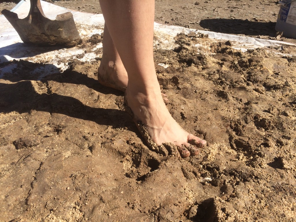 it turned out that mixing oven mud barefoot was not the happy hippie dance party that we'd been led to believe it would be. 