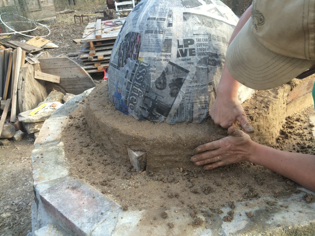 packing the oven mud interior layer