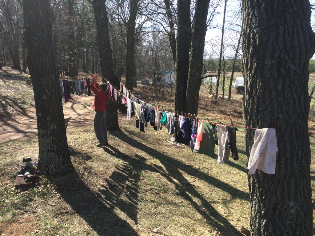 handwashing and line drying; not too bad, but the wringing part is a pain.