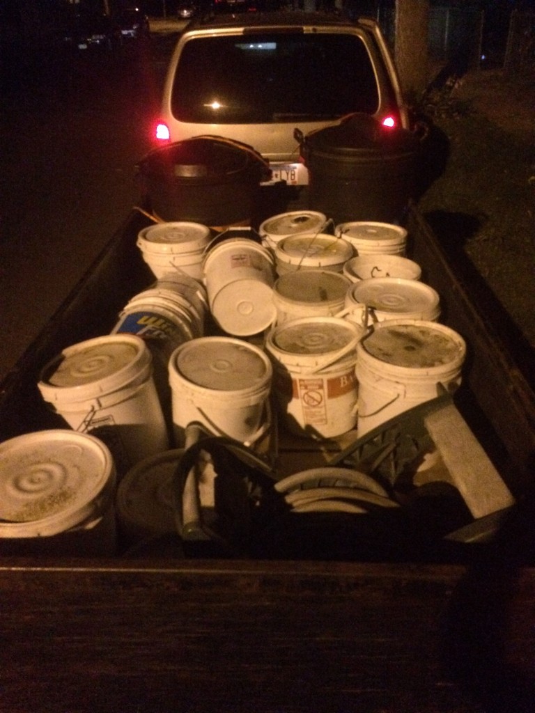 so much free potting soil!  (in the white buckets. the black garbage cans are filled with cafeteria kitchen trimmings, for compost)