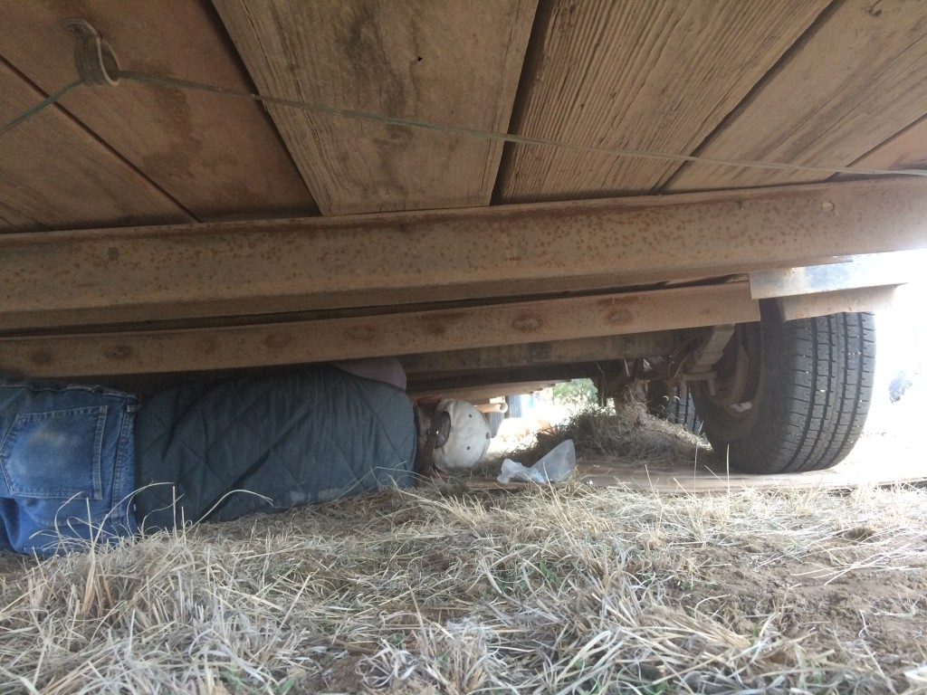 Dee drilling holes through the trailer bed. If I'm half as active at half his age, I'll be doing good I reckon ...