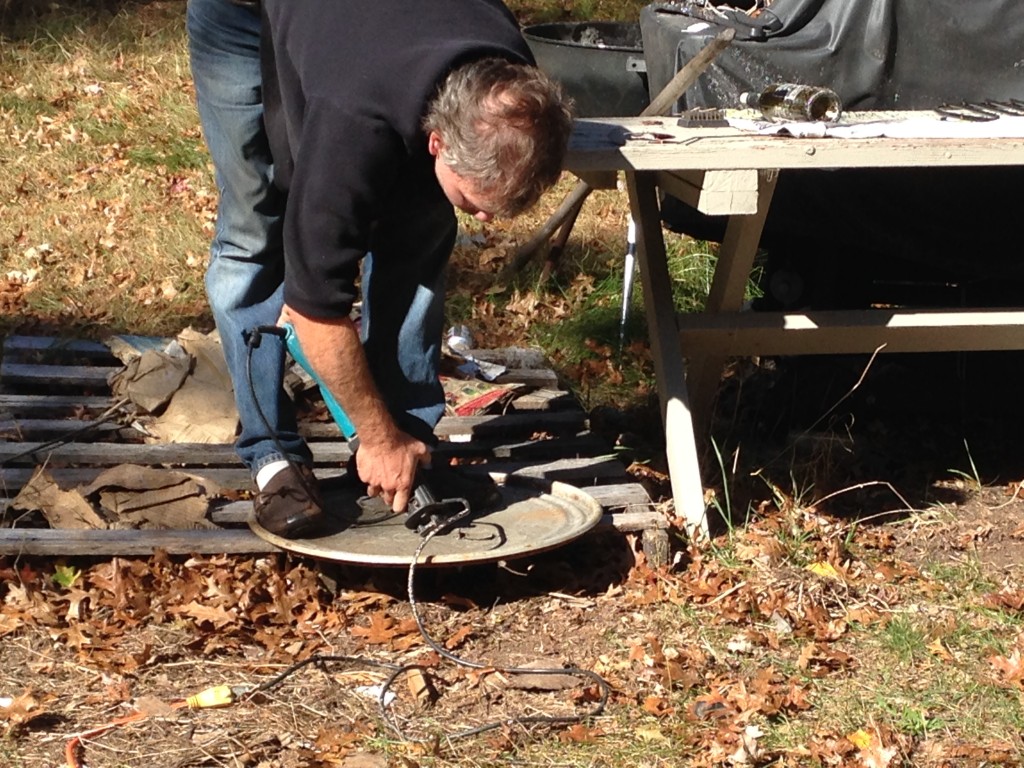 creating a lid for a "pocket rocket" - a way to create intense fire that would burn the paint off the 55-gallon drum