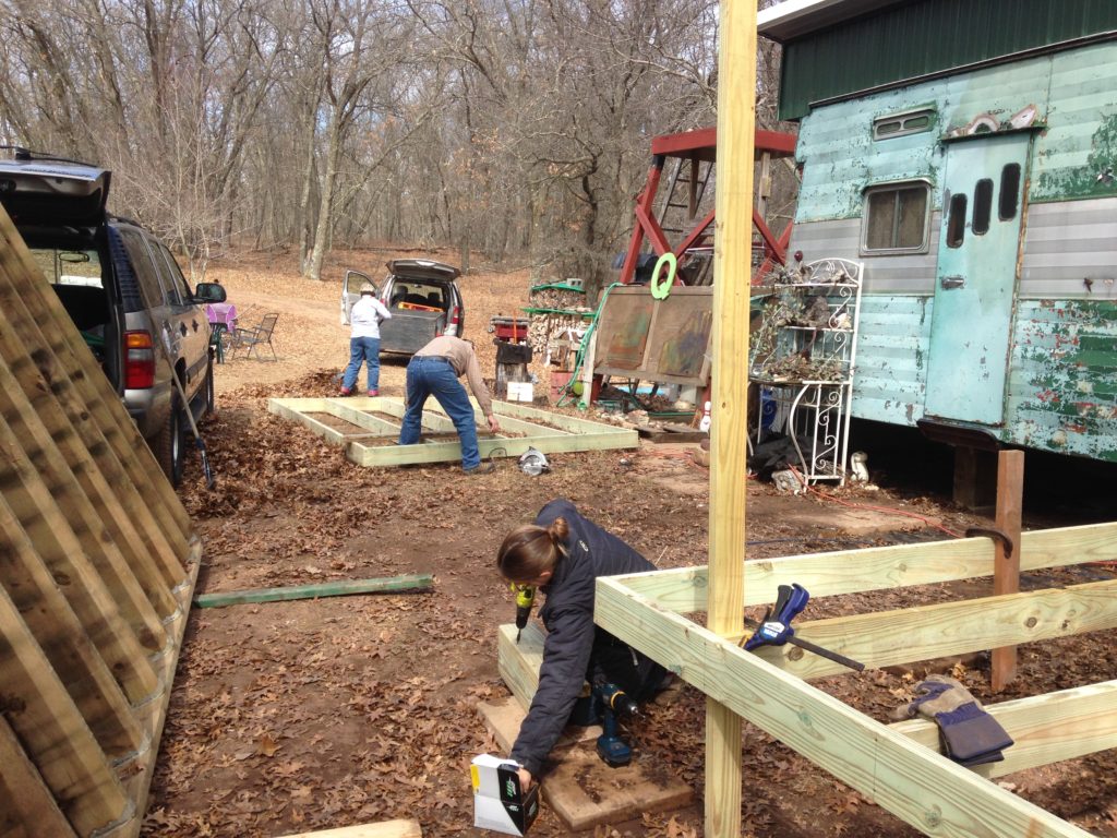 Sehr family project - Kristin with Matriarch and Patriarch Sehr, working on the expanded and improved screen porch