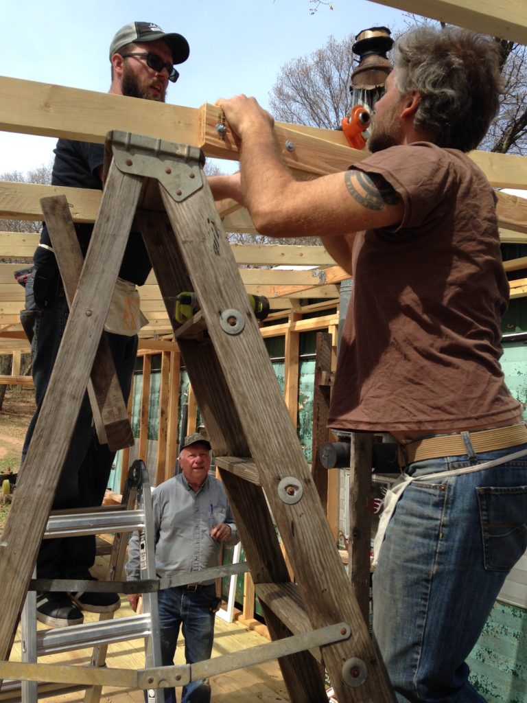 Eugene helping with the screen porch roof