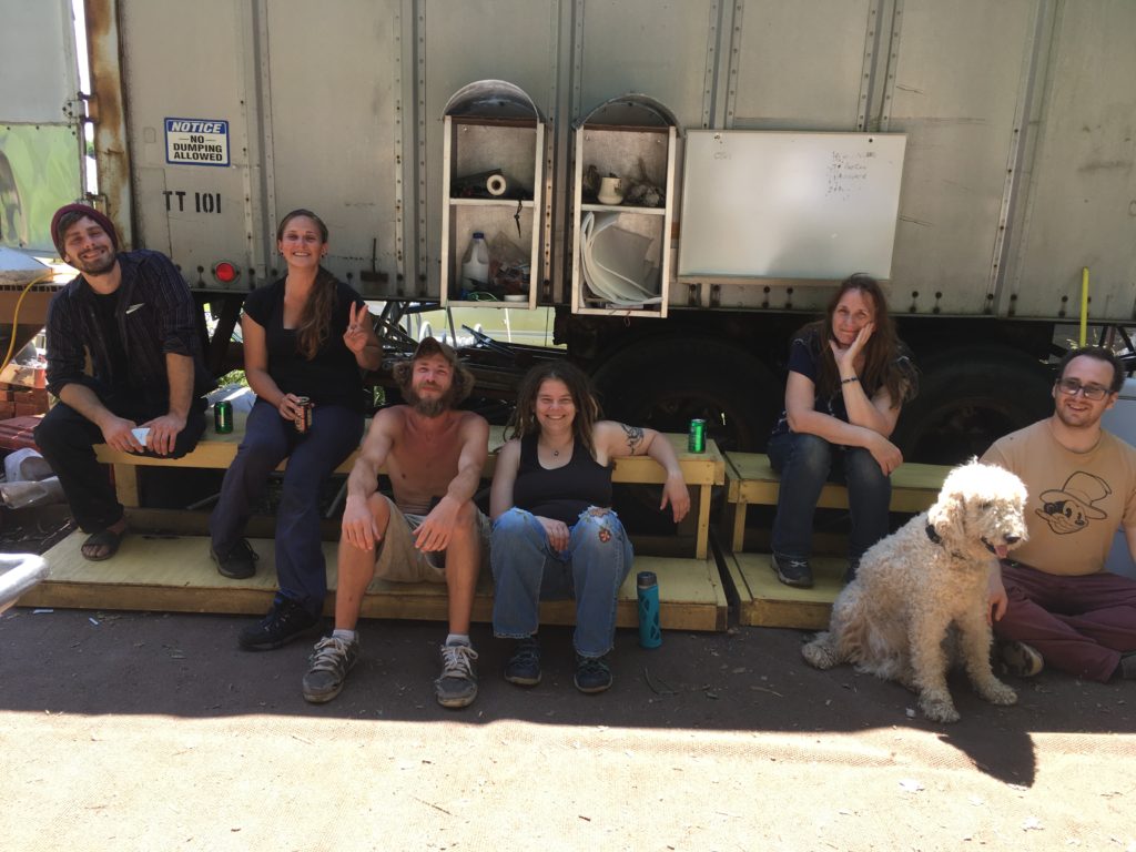 part of the CSA harvest crew relaxing after all the boxes were loaded up