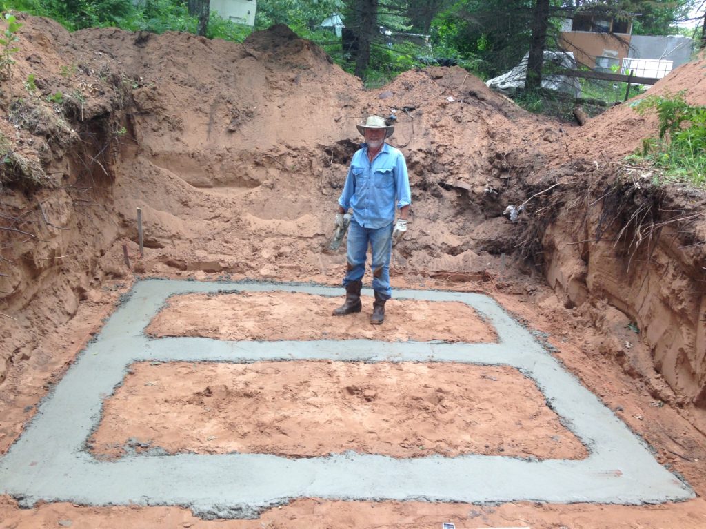 Gabe's Dad spent a few days at the farm and helped lead up the project to build the root cellar foundation properly