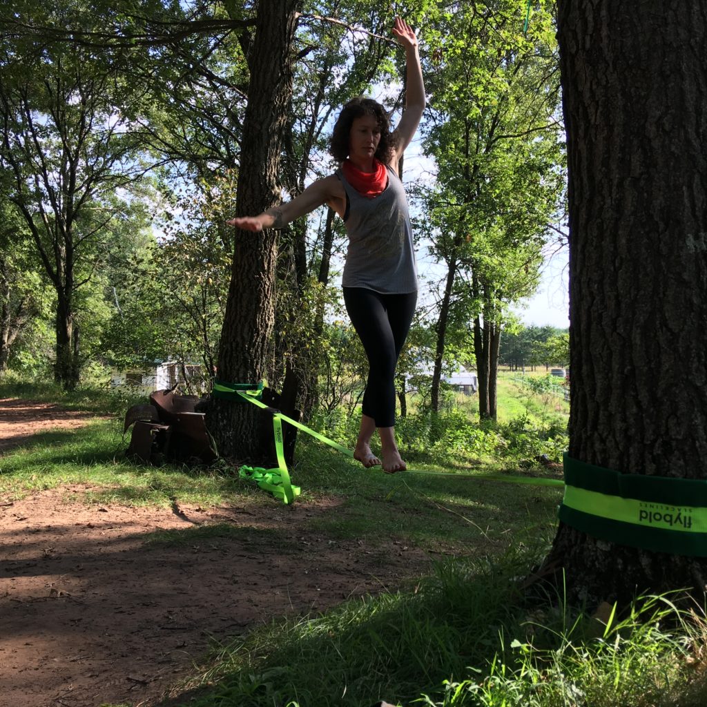 shareholder Tara brought a slack line to the farm for us to play with. Now I'm sore.